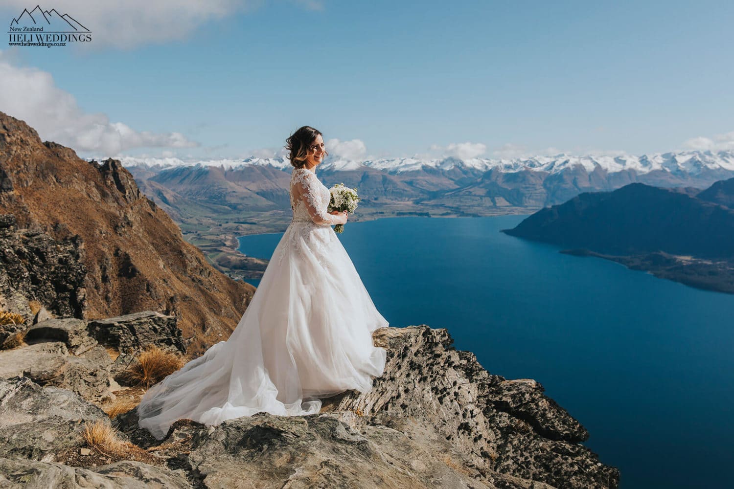 Bride on the edge of cliff in New Zealand