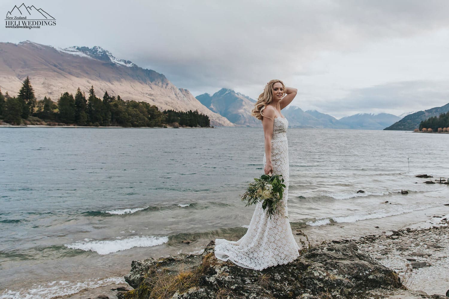 tall bride by the lake in Queenstown , Wedding photography New Zealand