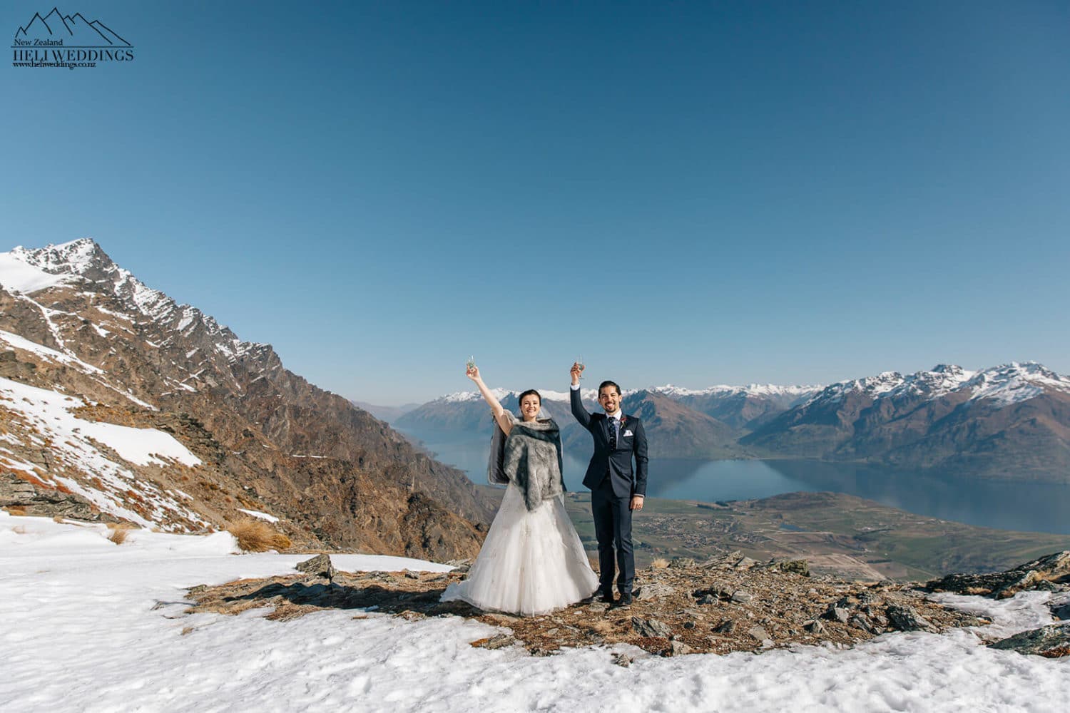 Bride and groom in the snow on the Remarkables