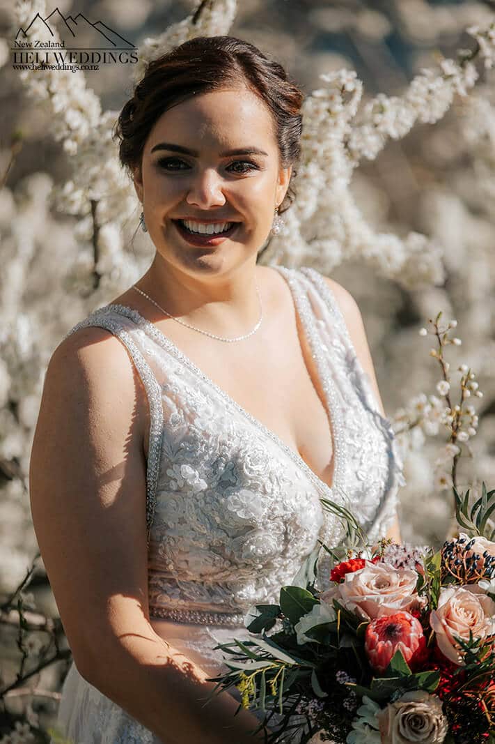 Bride among the blossoms in Queenstown
