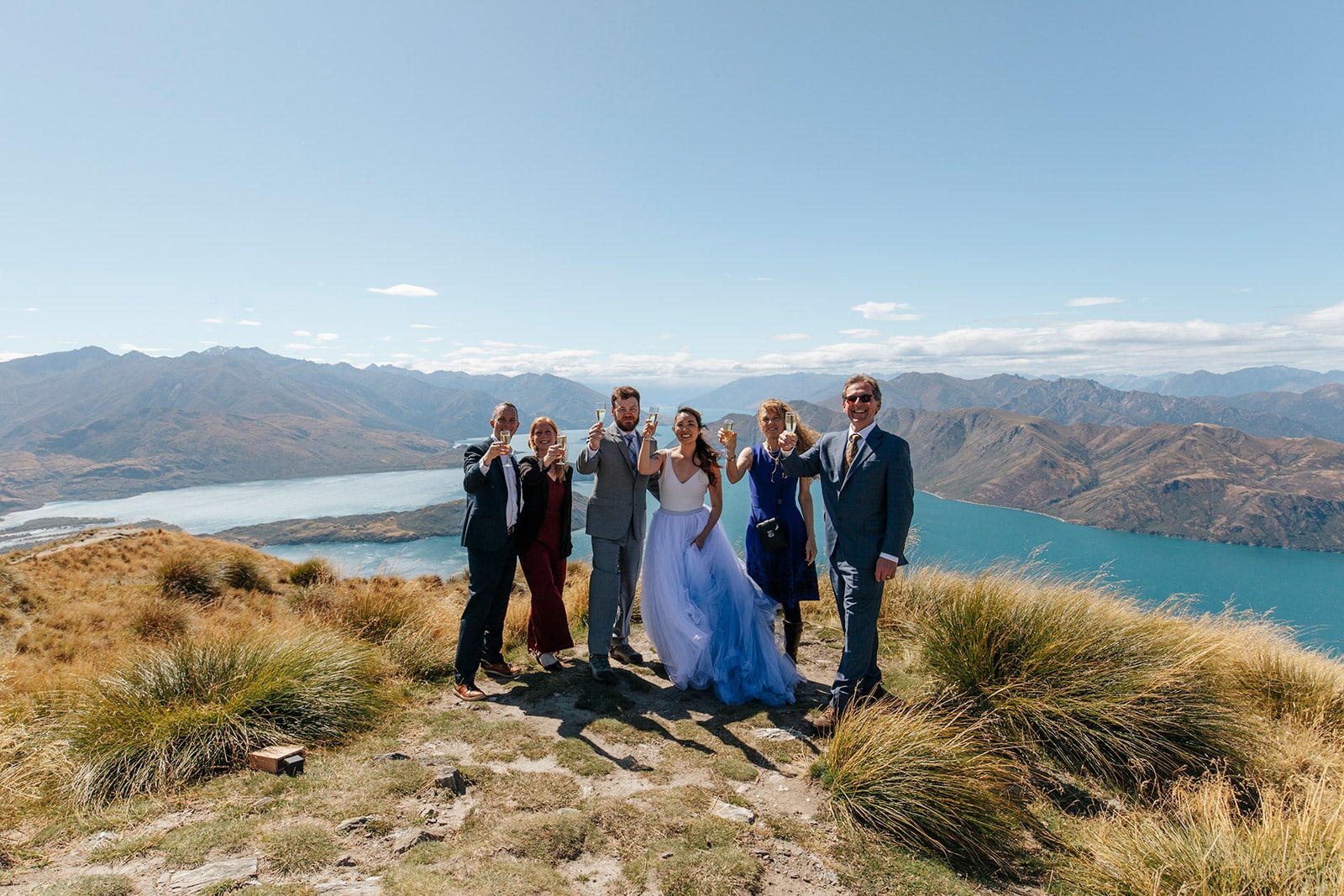 Heli Wedding on Coromandel Peak with a blue dress