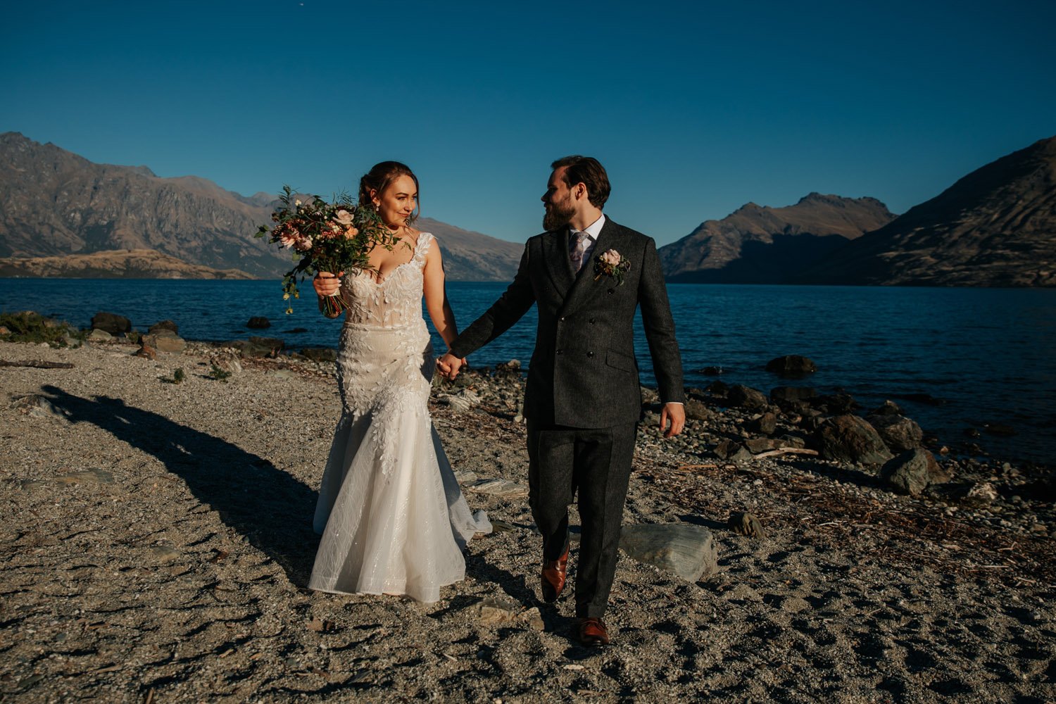 Autumn sunset wedding by the lake in Queenstown