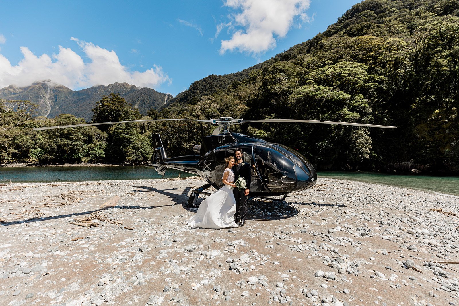 Queenstown luxury wedding with beach landing for photos