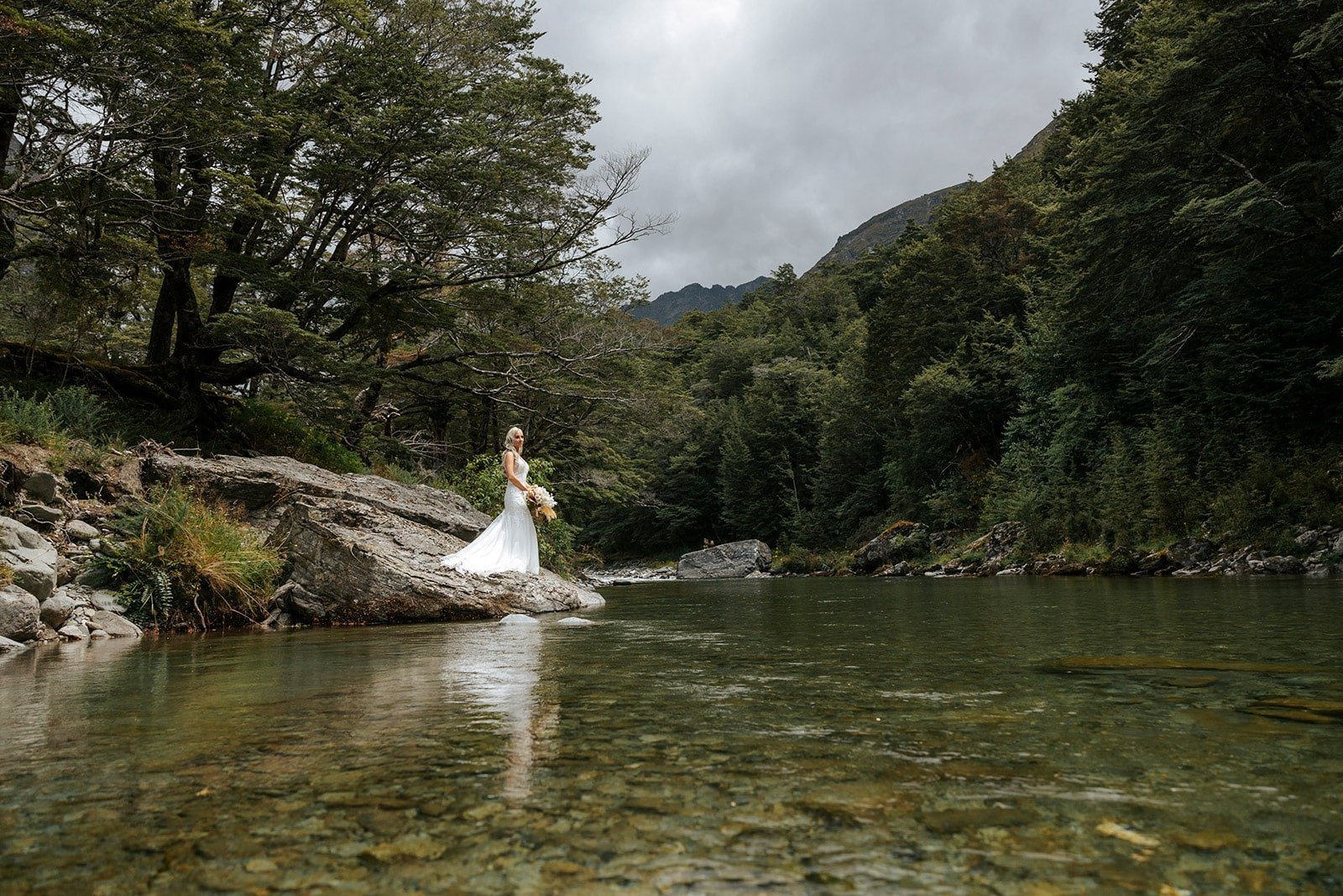 Heli Wedding in a beautiful forrest next to a river in Queenstown, secret wedding locations