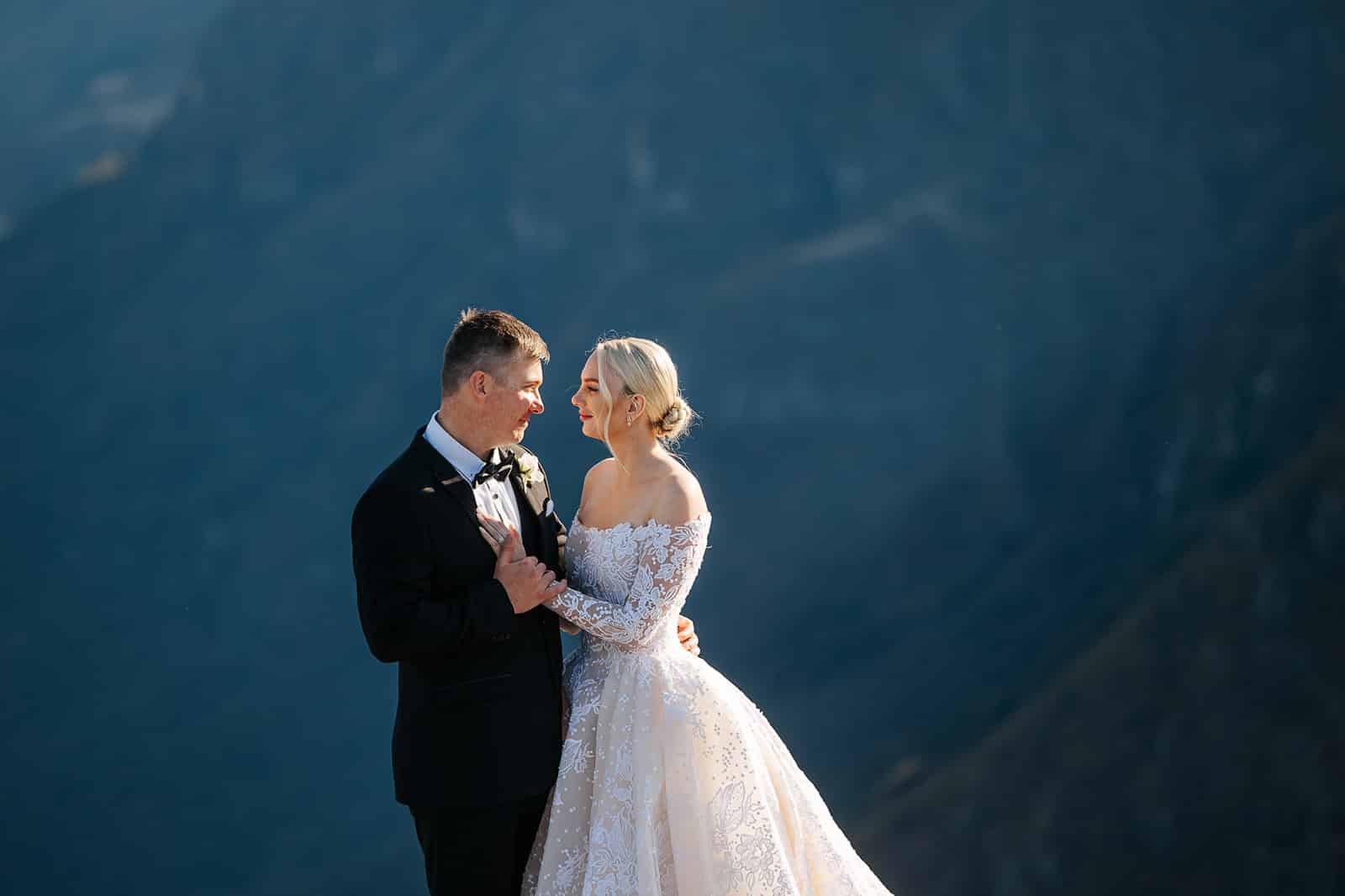 Heli Wedding on Round Hill and Bride wearing a Steven khalil wedding dress at Queenstown Wedding
