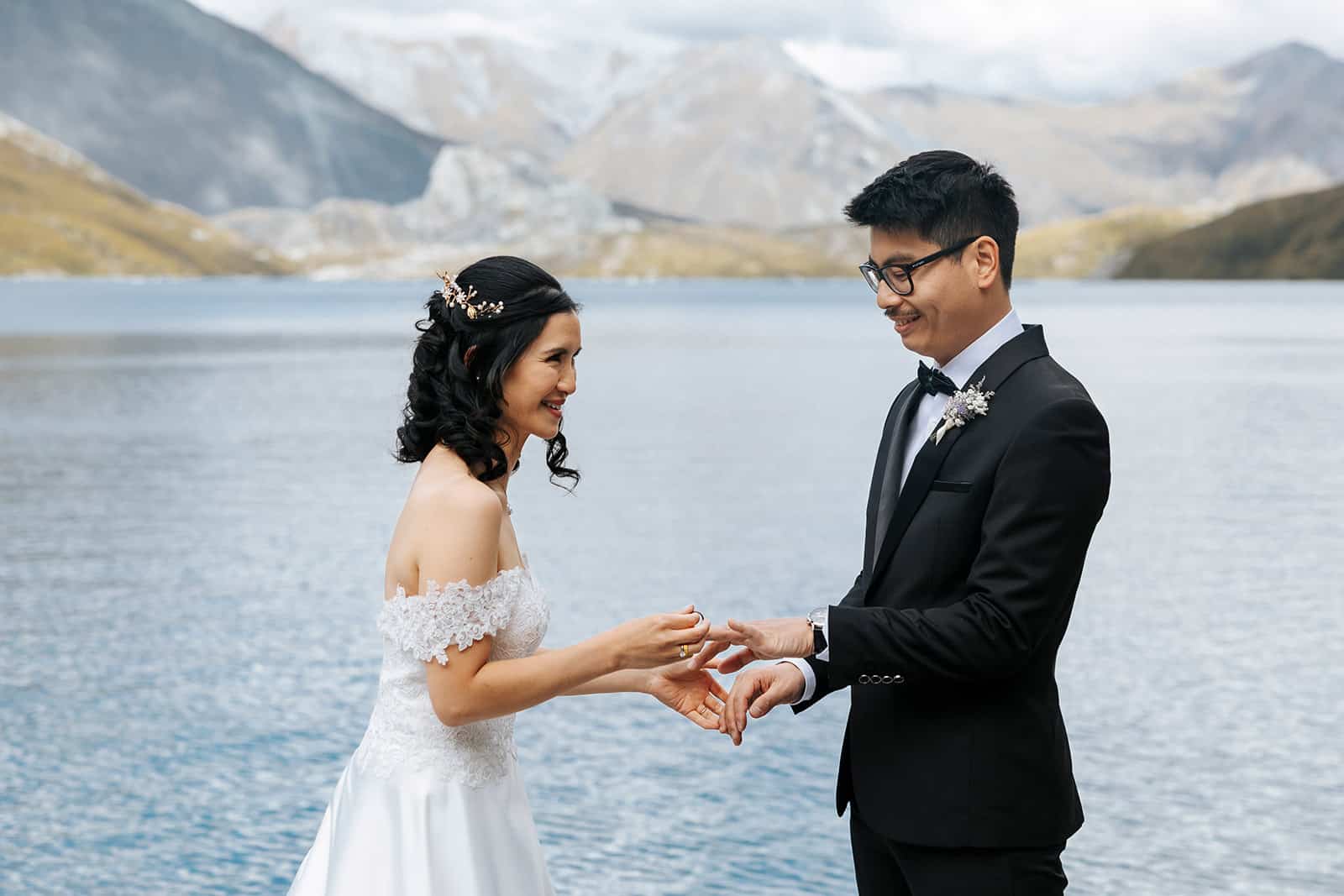 Heli Wedding ceremony at Lochnagar in Queenstown, bride and groom with lake in the background