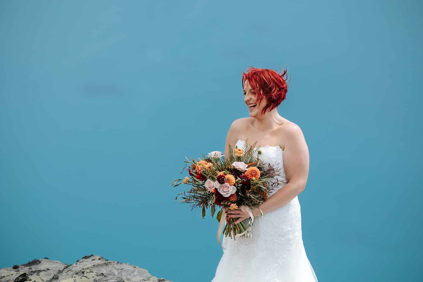 Heli Wedding Photos on The Ledge in Queenstown, bride with red hair