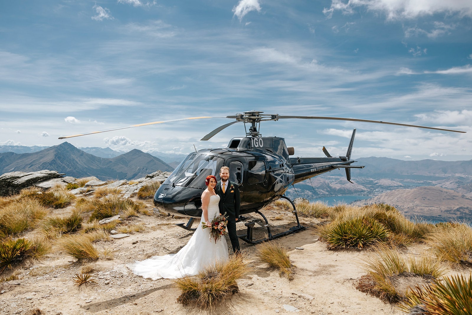 Heli Wedding Photos on The Ledge in Queenstown, bride with red hair