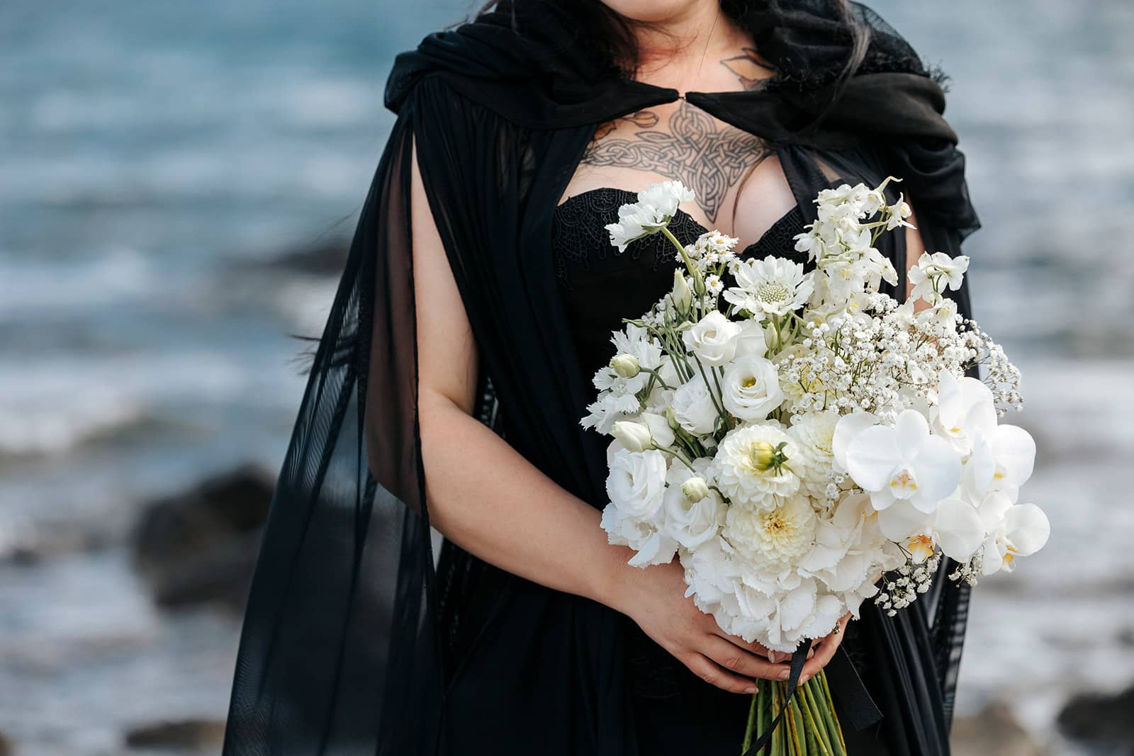 Alternative wedding with heavy metal theme and bride wearing black dress