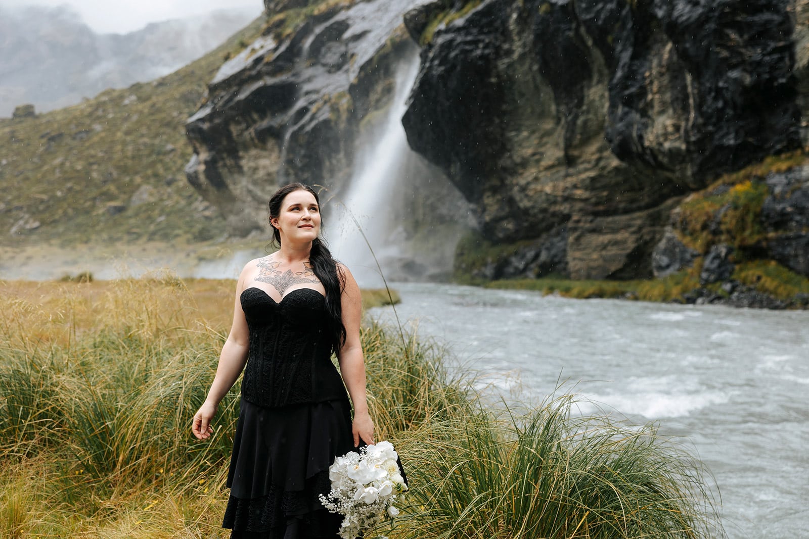 Alternative wedding with heavy metal theme and bride wearing black dress