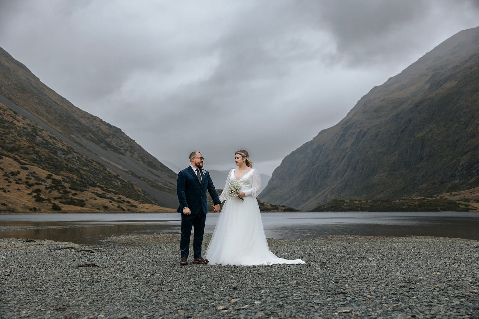 Heli wedding in Queenstown New Zealand next to alpine lake